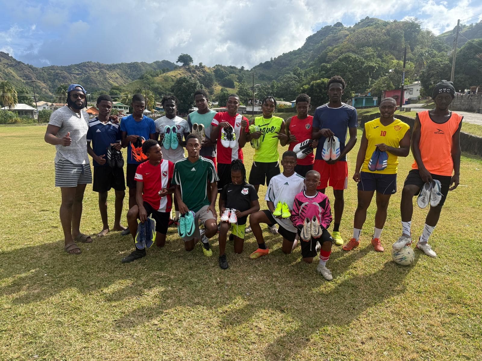 Players showing their boots on the village field